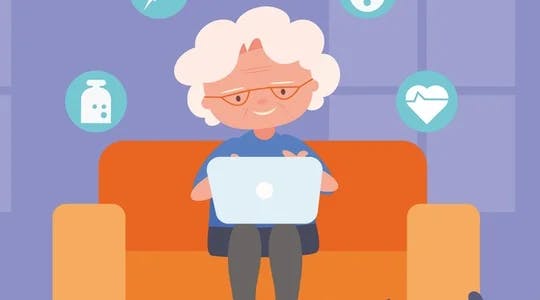Eldre kvinne med PC